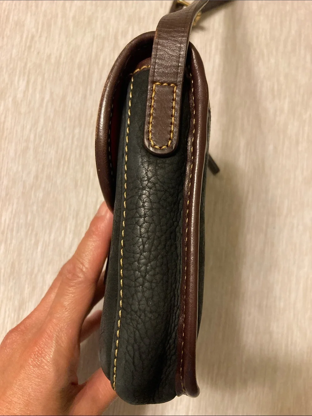 Dooney Bourke leather rubbing